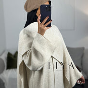 Robe longue en maille avec cape - Beige